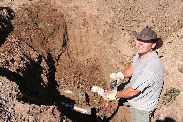 overhead shot of a man digging